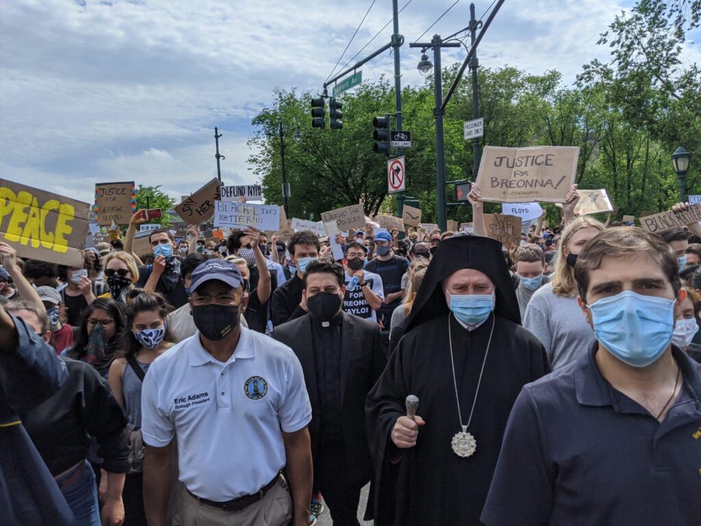 Archbishop Elpidophoros attends peaceful protest in Brooklyn, while stressing that ‘violence begets only more violence’