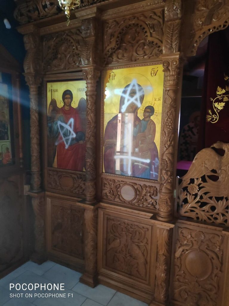 VANDALS SPRAY PAINT ICONS IN CYPRIOT CHURCH WITH UPSIDE-DOWN CROSSES, PENTACLE STARS